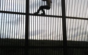 Border Wall, Brownsville, Texas, Immigrant, Crossing. July 2009 (Photo: Nofx221984, Public domain)