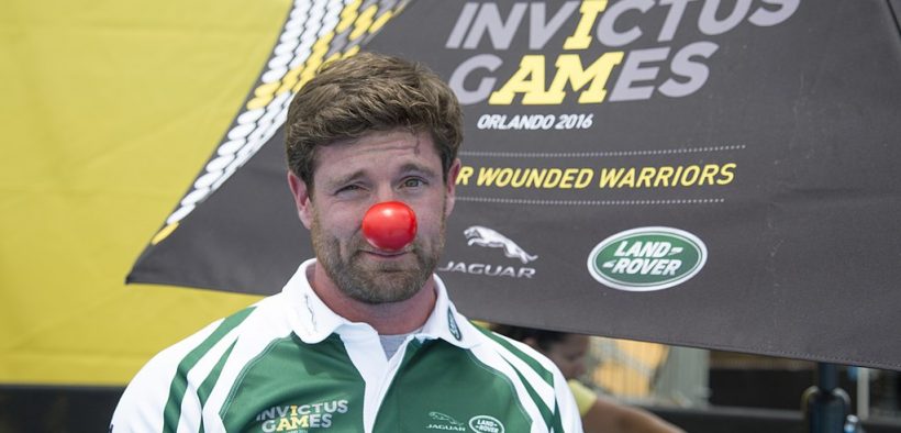 Noah Galloway, former United States Army Sergeant, poses for a photo wearing a red nose in support of Red Nose Day, a charity dedicated to helping children and having fun, after watching a swim event during the 2016 Invictus Games, ESPN Wide World of Sports Complex, Orlando, Fla., May 11, 2016.