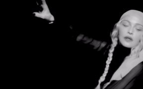 YouTube screenshot of Madonna's 'I Rise' music video.