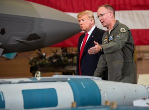 Brig. Gen. Todd Canterbury, 56th Fighter Wing commander briefs President Donald J. Trump about the capabilities of the GBU-12 bomb during his visit to Luke Air Force Base, Ariz., Oct. 19, 2018. After touring a static display of the F-35A Lightning II and other military equipment, Trump met with cabinet members, congressmen, and defense industry leaders in a roundtable discussion on current defense issues including cybersecurity, stealth technology, and F-35 development. (U.S. Air Force photo by Senior Airman Alexander Cook)