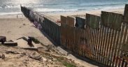 The U.S.-Mexico border wall extends into the Pacific Ocean with Playa Tijuana, Mexico to the south and San Ysidro, California to the north. The existing wall was built during the Clinton Administration. (Photo: Lauren von Bernuth)