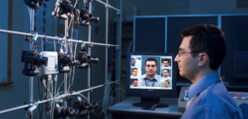 NIST computer scientist Ross Micheals demonstrates studying the performance of facial recognition software programs. (Courtesy of Wikimedia Commons)