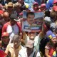 A Maduro supporter holds up a sign at a pro-Maduro rally in Caracas, Venezuela. (Photo: Orleny Ortiz)