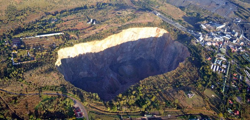 The pit at the Premier Mine, Cullinan, Gauteng, South Africa. The cross-sectional area of the 190 metre deep pit at its surface is about 32 hectares.[1] The mine was the source of the 3106 carat Cullinan Diamond, the largest diamond ever found.