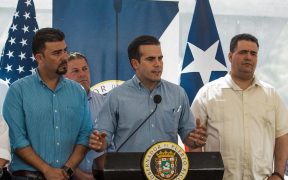 The Governor of Puerto Rico, Ricardo Rosselló addresses the media and survivors of Utuado, as part of the opening ceremony of the new bridge at the Río Abajo Community. The governor is accompanied by Ernesto Irizarry, Mayor of Utuado (left) and Carlos Contreras (right) Secretary of the Puerto Rico Department of Transportation. FEMA/Eduardo Martínez