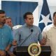 The Governor of Puerto Rico, Ricardo Rosselló addresses the media and survivors of Utuado, as part of the opening ceremony of the new bridge at the Río Abajo Community. The governor is accompanied by Ernesto Irizarry, Mayor of Utuado (left) and Carlos Contreras (right) Secretary of the Puerto Rico Department of Transportation. FEMA/Eduardo Martínez