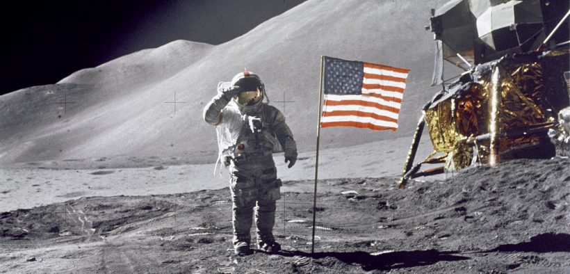 Astronaut David R. Scott, commander, gives a military salute while standing beside the deployed U.S. flag during the Apollo 15 lunar surface extravehicular activity (EVA) at the Hadley-Apennine landing site. The flag was deployed toward the end of EVA-2. The Lunar Module "Falcon" is partially visible on the right. Hadley Delta in the background rises approximately 4,000 meters (about 13,124 feet) above the plain. The base of the mountain is approximately 5 kilometers (about 3 statute miles) away. This photograph was taken by Astronaut James B. Irwin, Lunar Module pilot