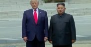 President Trump and Kim Jong Un shake hands at Korean DMZ at impromptu meeting.