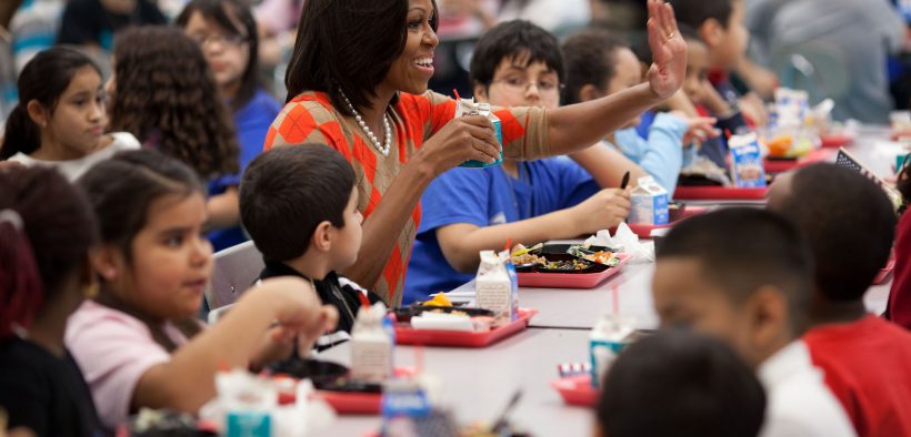 First Lady Michelle Obama and Agriculture Secretary Tom Vilsack visit Parklawn Elementary School in Alexandria, Virginia, Jan. 25, 2012. They join children for lunch in the cafeteria where the school's food service employees and celebrity cook Rachael Ray serve a healthy meal that meets the United States Department of AgricultureÕs (USDA) new and improved nutrition standards for school lunches. (Photo: Official White House Photo by Chuck Kennedy)