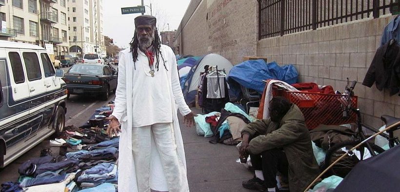 Homeless-Civil Rights activists Ted Hayes at sidewalk encampment in downtown Los Angeles Central City East District, dubbed Skid Row, the national capital, "ground 0" and "black hole" of homelessness.