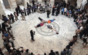 Catholics protesting the treatment of undocumented migrants in US custody at the Senate, on the Catholic Day of Action for Immigrant Children, July 18, 2019. (Photo: Eli McCarthy, The Conversation)