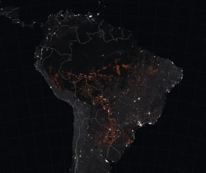 The map above shows active fire detections in Brazil as observed by Terra and Aqua MODIS between August 15-22, 2019. The locations of the fires, shown in orange, have been overlain on nighttime imagery acquired by VIIRS.