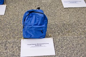 End U.S. Involvement in the Saudi War in Yemen protest in Chicago, Illinois. Date: November 30, 2018. Blue backpacks stood for each one of the children killed in a Saudi bombing attack on a school bus in late 2018. They used a 500 pound bomb manufactured by Lockheed-Martin. (Photo: Charles Edward Miller)