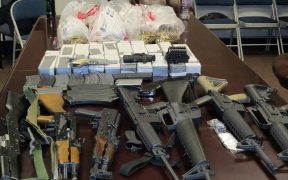 U.S. Customs and Border Protection officers conducting outbound inspections at Arizona’s Port of Lukeville arrested two Mexican nationals after finding unreported U.S. currency, weapons and ammunition in separate seizures. Date: March 16, 2017 (Photo: U.S. Customs and Border Protection)