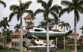 President Donald J. Trump aboard Marine One lands back at Mar-a-Lago as an escort helicopter hovers Friday, March 29, 2019