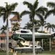 President Donald J. Trump aboard Marine One lands back at Mar-a-Lago as an escort helicopter hovers Friday, March 29, 2019