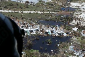 The U.S. Coast Guard inspects damaged areas by Hurricane Dorian in support of search and rescue and humanitarian aid in the Bahamas, Sept. 4, 2019. The Coast Guard is supporting the Bahamian National Emergency Management Agency and the Royal Bahamian Defense Force, who are leading search and rescue efforts in the Bahamas (Photo: U.S. Coast Guard Seaman Erik Villa Rodriguez)