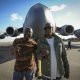 Dave Chappelle (right) and Donnell Rawlings, actors and comedians, stand in front of a C-17 Globemaster III Feb. 2, 2017, at Joint Base Charleston, S.C.