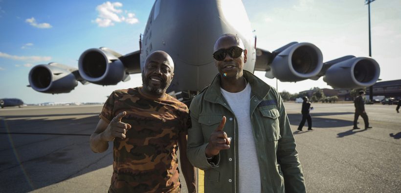 Dave Chappelle (right) and Donnell Rawlings, actors and comedians, stand in front of a C-17 Globemaster III Feb. 2, 2017, at Joint Base Charleston, S.C.