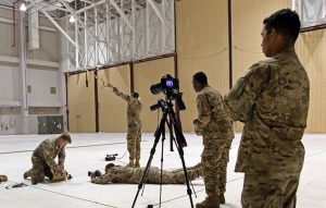 U.S. Army Soldiers assigned to the Military Information Support Task Force-Central (MISTF-C) Production Development Detachment capture a Psychological Operations Specialist setting up a Next Generation Loudspeaker System on Dec. 7, 2016 at Al Udeid Air Base, Qatar. (Photo: U.S. Army, Staff Sgt. Brian)