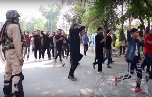 A Muslim procession in Kashmir is interrupted by government forces. (Photo: YouTube, AFP)