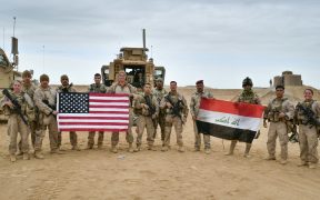 U.S. Marines deployed in support of Combined Joint Task Force Operation Inherent Resolve pose with Iraqi service members in Iraq, Nov. 27, 2017.