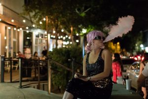 woman using cannabis vaping pen