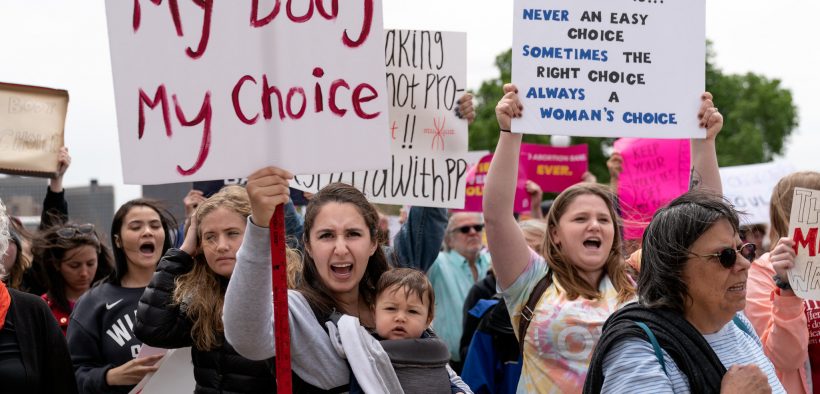 My body my choice sign at a Stop Abortion Bans Rally in St Paul, Minnesota