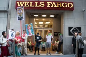 During the Global Youth Climate Strike on September 25, 2019 protesters gather outside Wells Fargo in San Francisco, CA to protest the bank's role in financing the fossil fuel industry. (Photo: Peg Hunter)