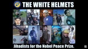 Syrian White Helmet members photographed in White Helmet uniforms and carrying guns. (Photo: YouTube)