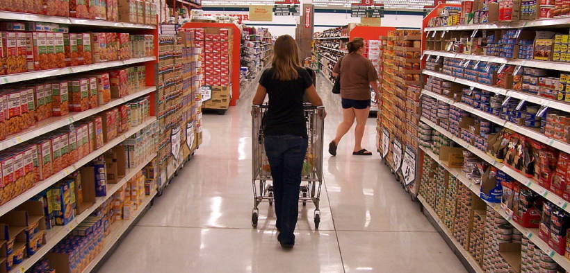 Woman shopping at a grocery store.