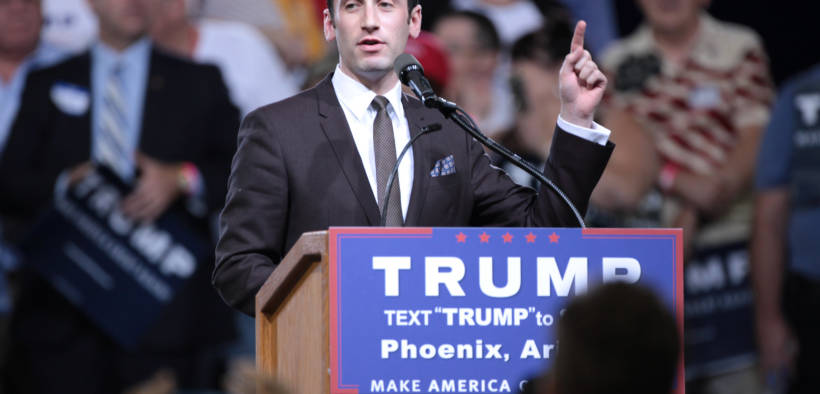 Stephen Miller speaking with supporters of Donald Trump at a rally at Veterans Memorial Coliseum at the Arizona State Fairgrounds in Phoenix, Arizona.