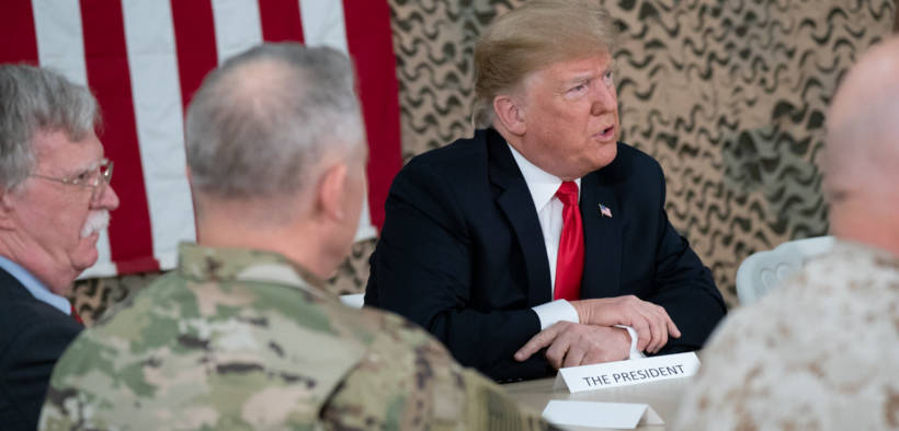 President Donald J. Trump, joined by First Lady Melania Trump, attends a briefing with military leadership members Wednesday, December 26, 2018, at the Al-Asad Airbase in Iraq. (Official White House Photo by Shealah Craighead)