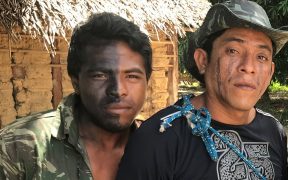 “Guardians of the Forest” Paulo Paulino Guajajara (left) and Laércio Guajajara (right) pose for a photo before going on patrol in the Araribóia indigenous reserve, in Maranhão state, on Jan 30, 2019. (Photo: Karla Mendes/Mongabay)