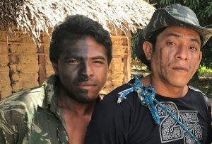 “Guardians of the Forest” Paulo Paulino Guajajara (left) and Laércio Guajajara (right) pose for a photo before going on patrol in the Araribóia indigenous reserve, in Maranhão state, on Jan 30, 2019. (Photo: Karla Mendes/Mongabay)