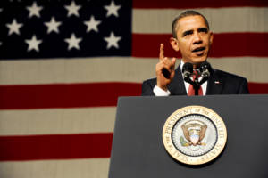 President Barack Obama gives a speech to a crowd of military personnel and civilians gathered at Elmendorf Air Force Base, Alaska, Nov. 12, 2009.