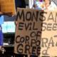 Members of Occupy Wall Street Maui protesting at Monsanto in Kihei. Date: January 28, 2012. (Photo: Viriditas)