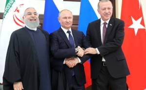 Joint meeting between Russian President Vladimir Putin, President of Iran Hassan Rouhani (left) and President of Turkey Recep Tayyip Erdogan in February 2019.