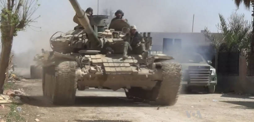Syrian Army tanks advance during Operation Damascus Steel in March 2018