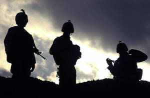 Three US Army (USA) Soldiers from 1st Battalion (BN), 505th Parachute Infantry Regiment (PIR), Task Force Panther, 82nd Airborne Division (AD), Kandahar Army Airfield, Afghanistan (AFG), pause on top of a hill before proceeding towards their remain over night (RON) site on the outskirts of Shinkay Village, Afghanistan