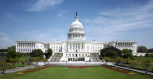 The western front of the United States Capitol. The Neoclassical style building is in Washington, D.C., on Capitol Hill, at the east end of the National Mall.