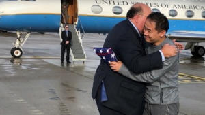 Xiyue Wang being greeted by American officials after being released by Iran in a prisoner swap on Saturday. (Photo: YouTube)