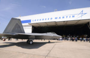 A crowd that included Air Force leadership, Senators and congressional representatives, executives and plant personnel from the Lockheed Martin Aeronautics Corporation attended a ceremony dedicating the delivery of the final F-22 Raptor in Marietta, Ga., May 2. (U.S. Air Force photo/Don Peek)