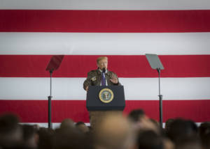 President Donald J. Trump addresses service members during a Troop Talk, Nov. 5, 2017, at Yokota Air Base, Japan. During his talk, Trump highlighted the importance of the U.S. – Japan alliance in the Indo-Asia Pacific region. U.S. Air Force photo by Airman 1st Class Juan Torres)