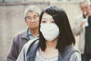 Chinese woman with medical mask on