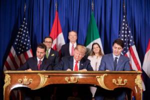 November 30, 2018 President Donald Trump and Mexican President Enrique Peña Nieto and Canadian Prime Minister Justin Trudeau in Buenos Aires, Argentina (Buenos Aires) signs agreement. (Official White House Photo by Shealah Craighead)