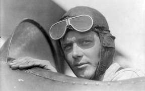 Charles Lindbergh wearing helmet with goggles up