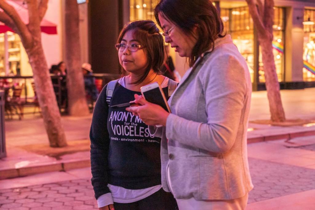 Before shelter-in-place orders took effect, animal rights activist Juvel Ingal (left) regularly participated in street outreach. (Photo credit: Salomon Peña)