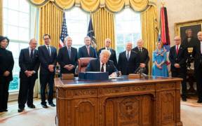 800px President Trump Signs the CARES Act 49716554661